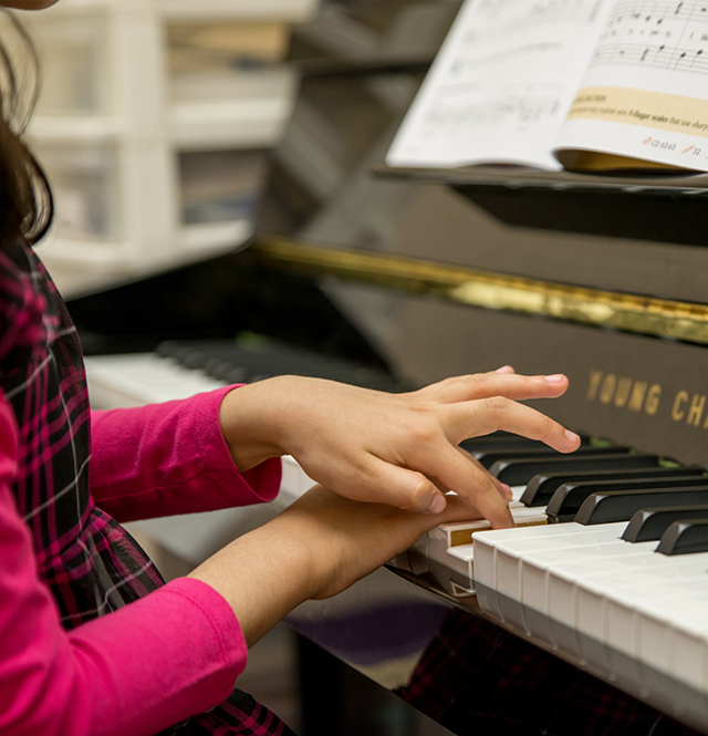 Girl playing the piano